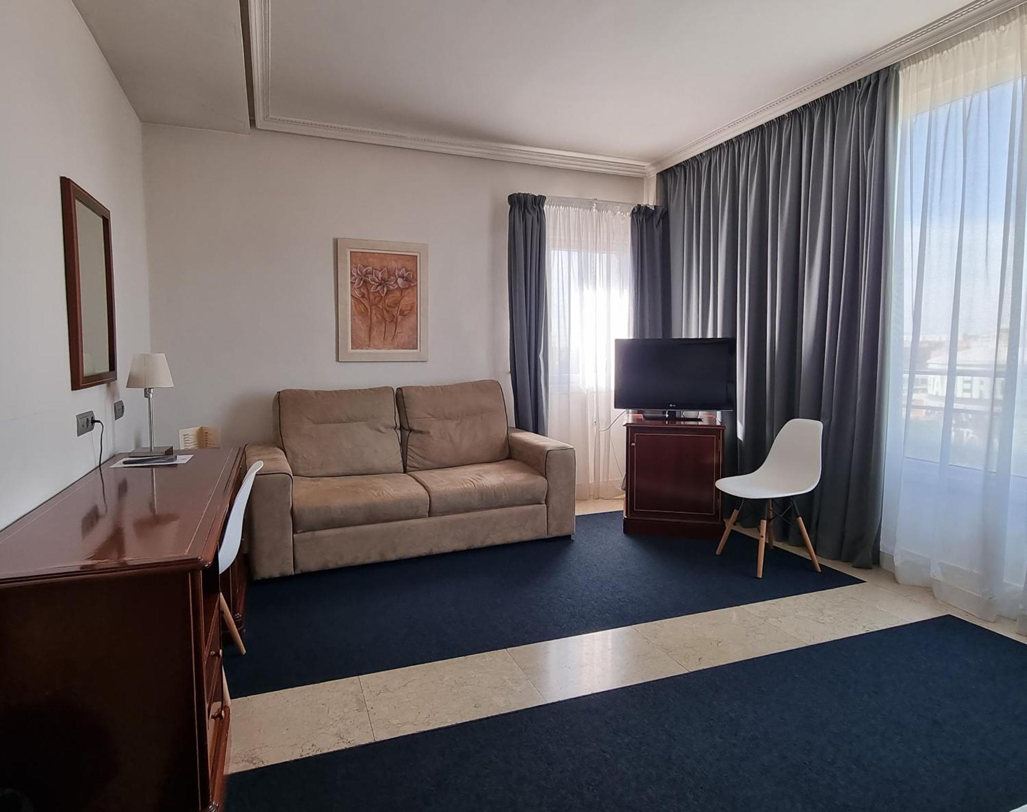 Triple Room (2 Adults + 1 Child)