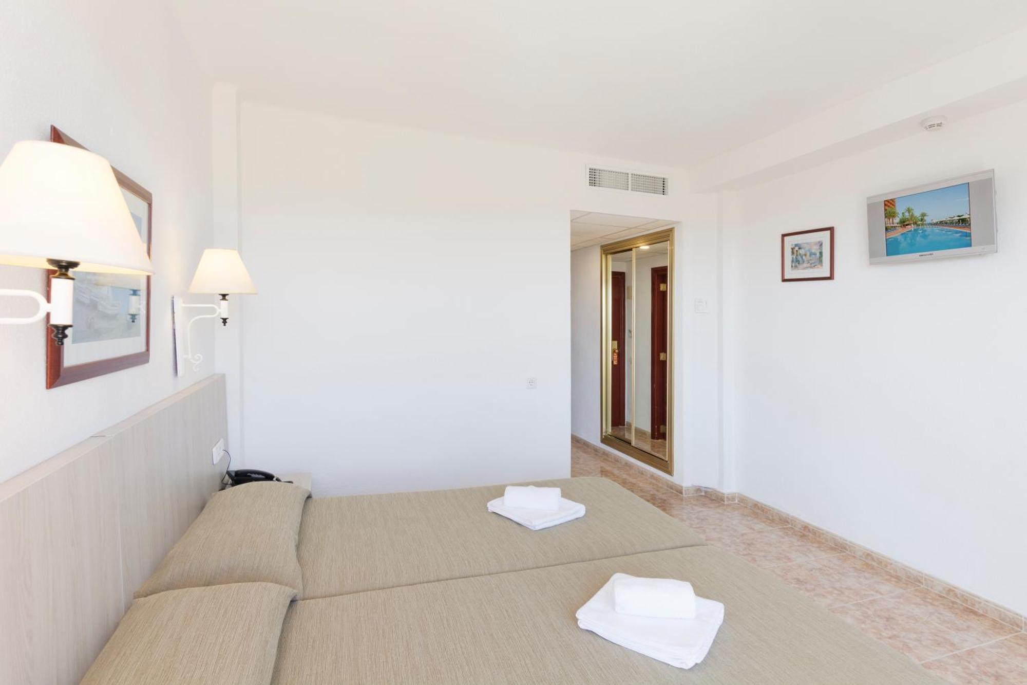 Habitación Doble (2 adultos + 2 niños)