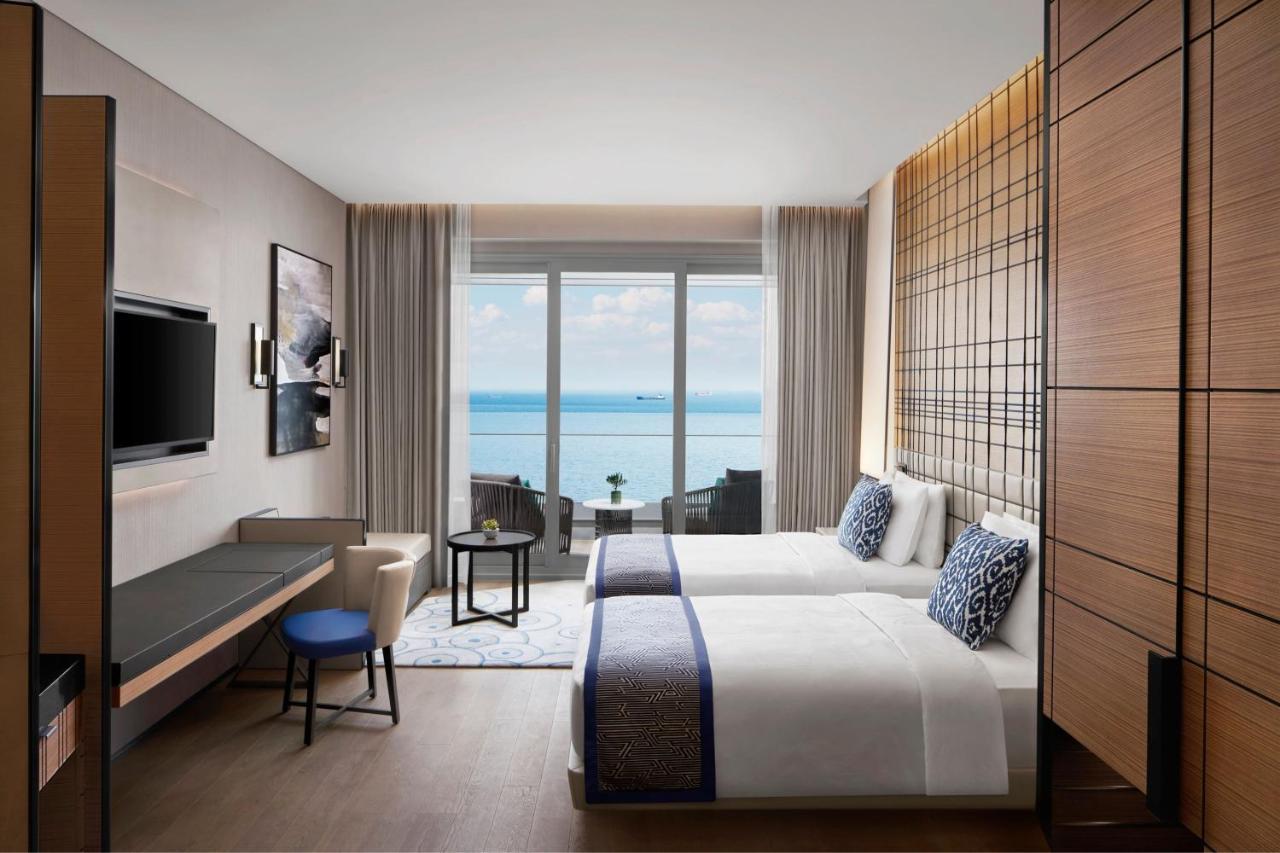 Deluxe Zweibettzimmer mit Balkon und Meerblick