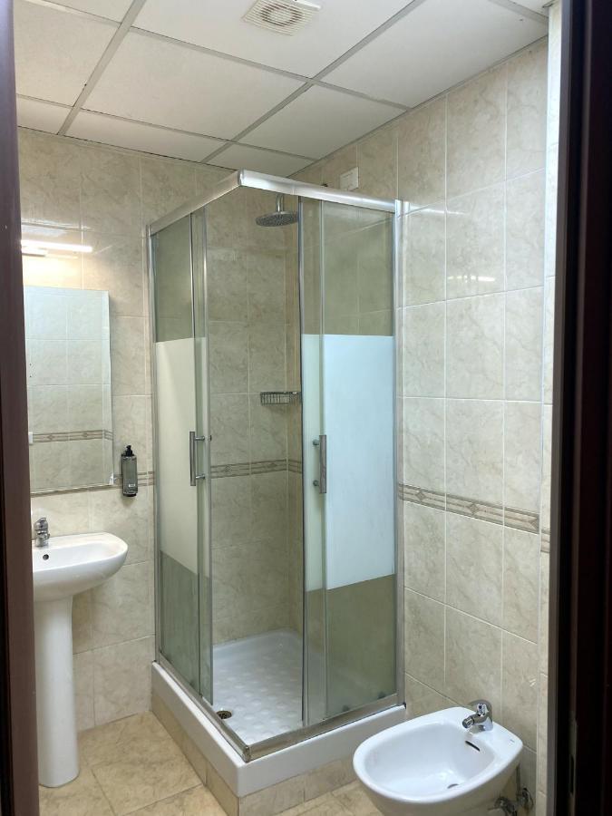 Chambre Quadruple avec Salle de Bains Privative