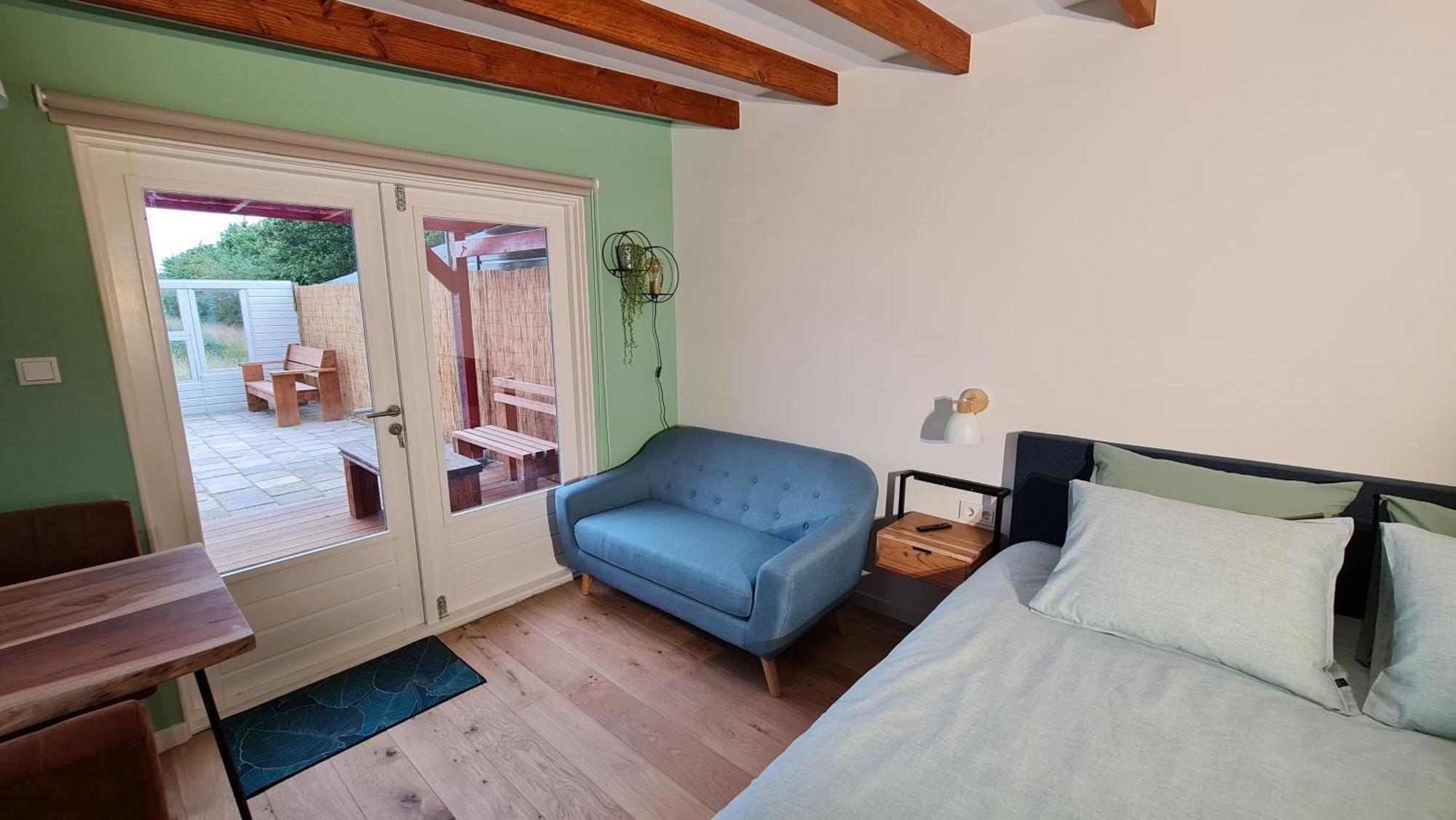 Kamer met Kingsize Bed en Uitzicht op de Tuin