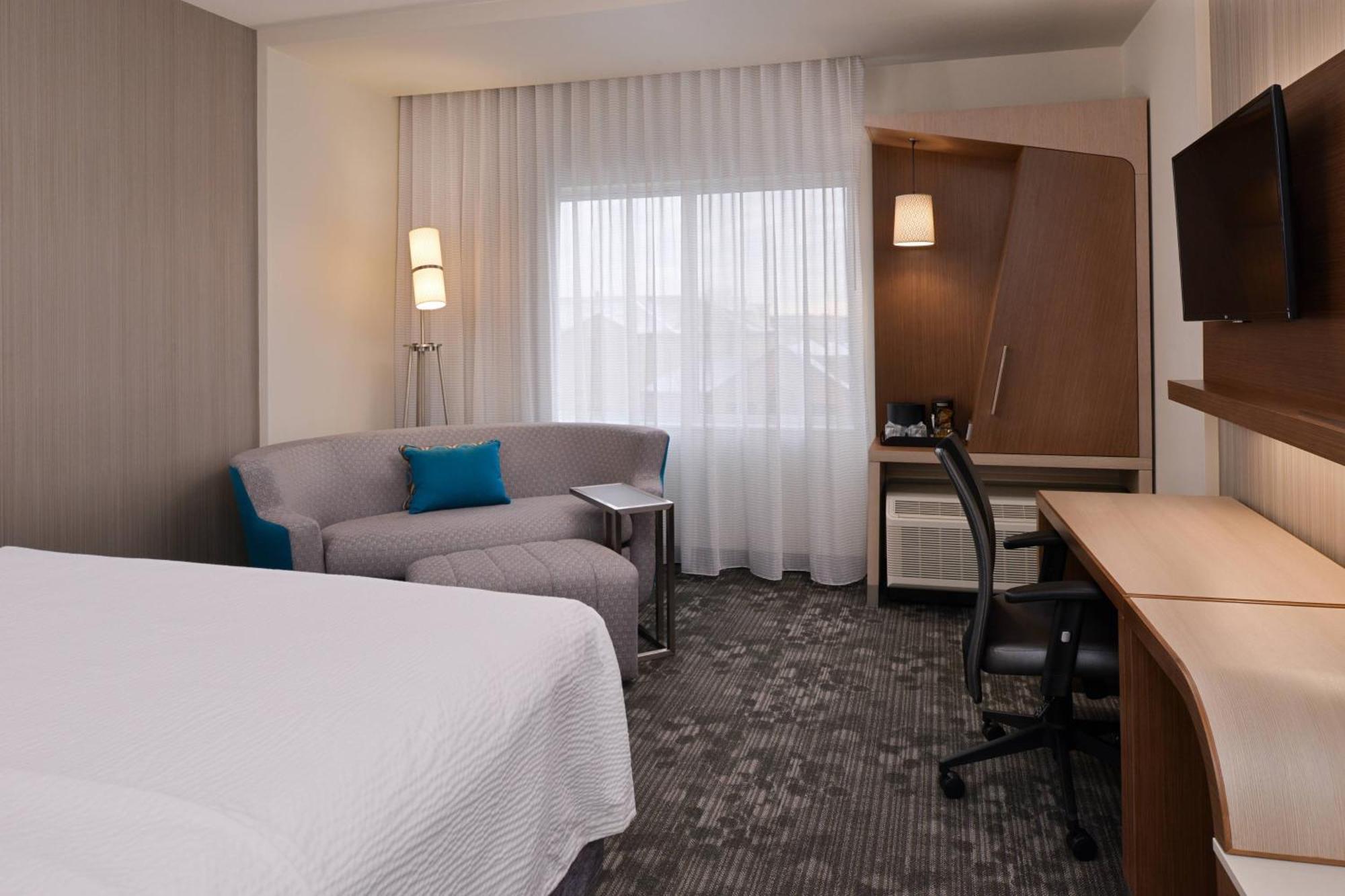 King Room with Sofa Bed and Roll-in Shower - Mobility and Hearing Accessible