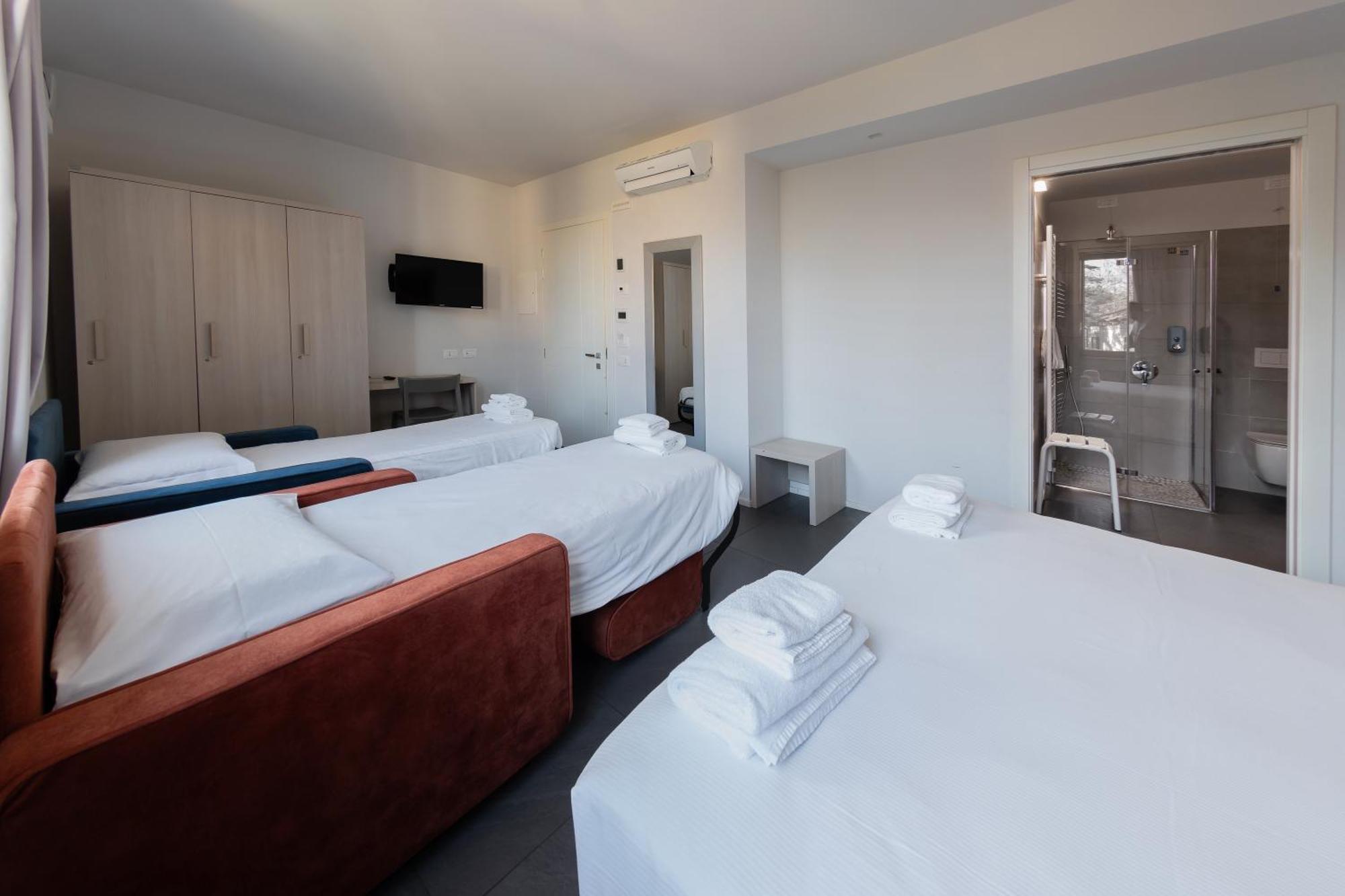 Chambre Quadruple avec Salle de Bains Privative