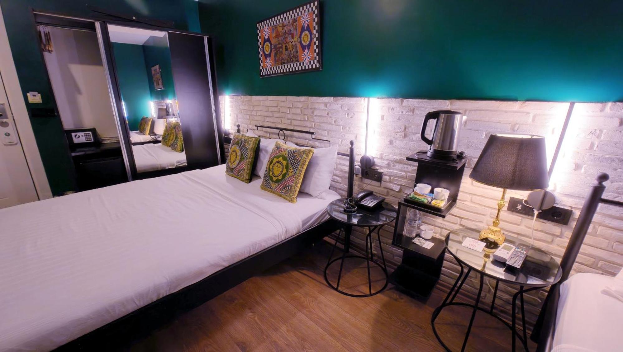 Kamer met 2 Queensize Bedden