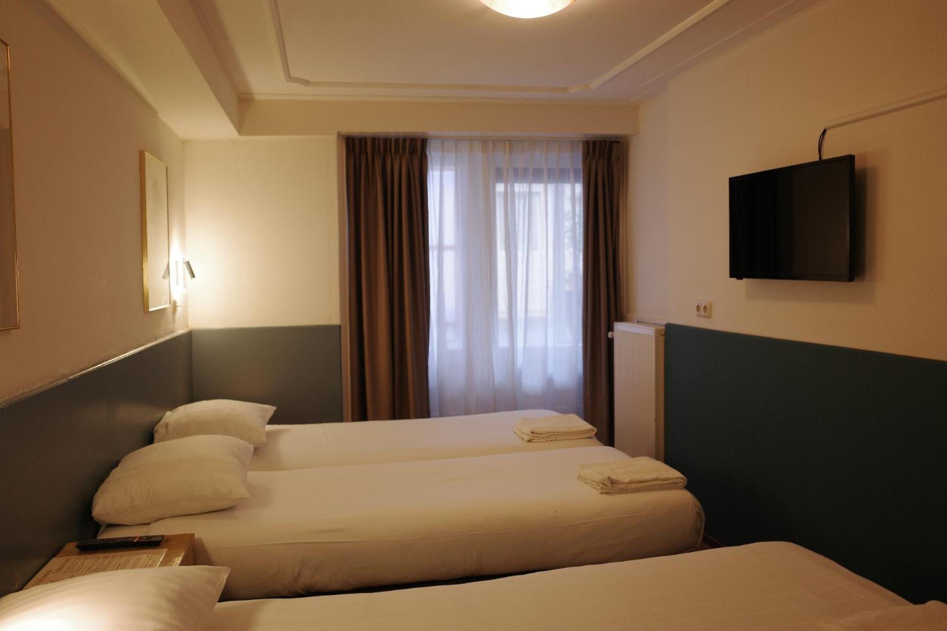 Dreibettzimmer mit eigenem Bad