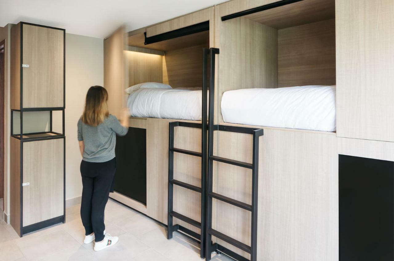 Cama Individual en dormitorio compartido de 6 camas